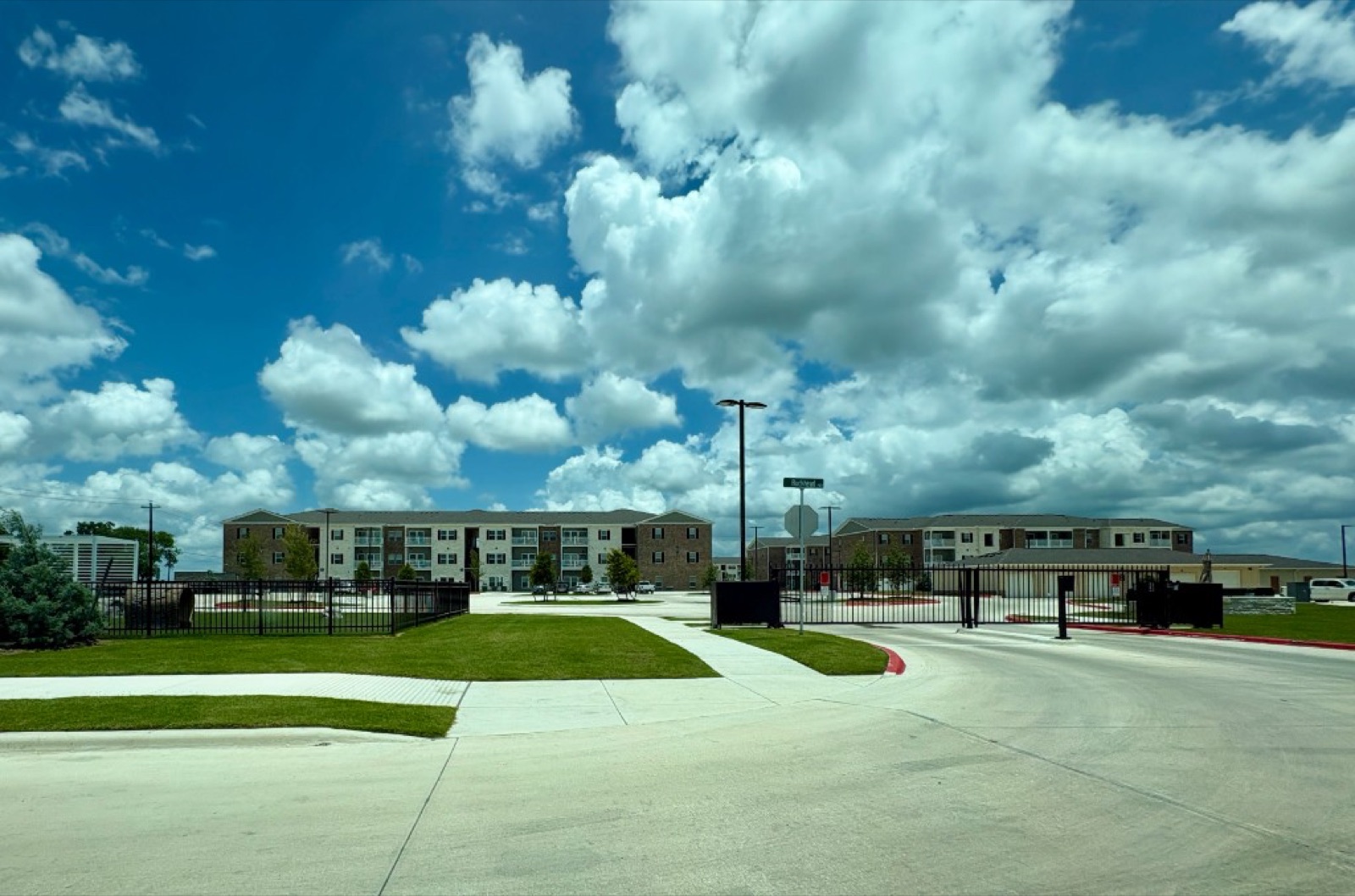 Whispering Pointe Apartments with nearby roads and development