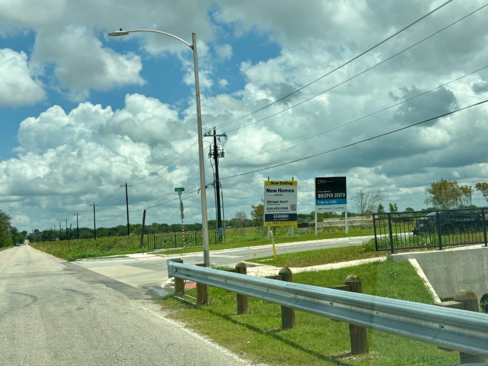 Intersection at 0.4 miles leading to Whisper South housing development